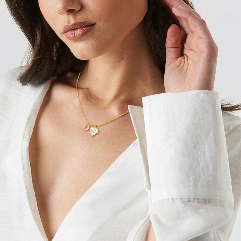 White heart-shaped letter necklace